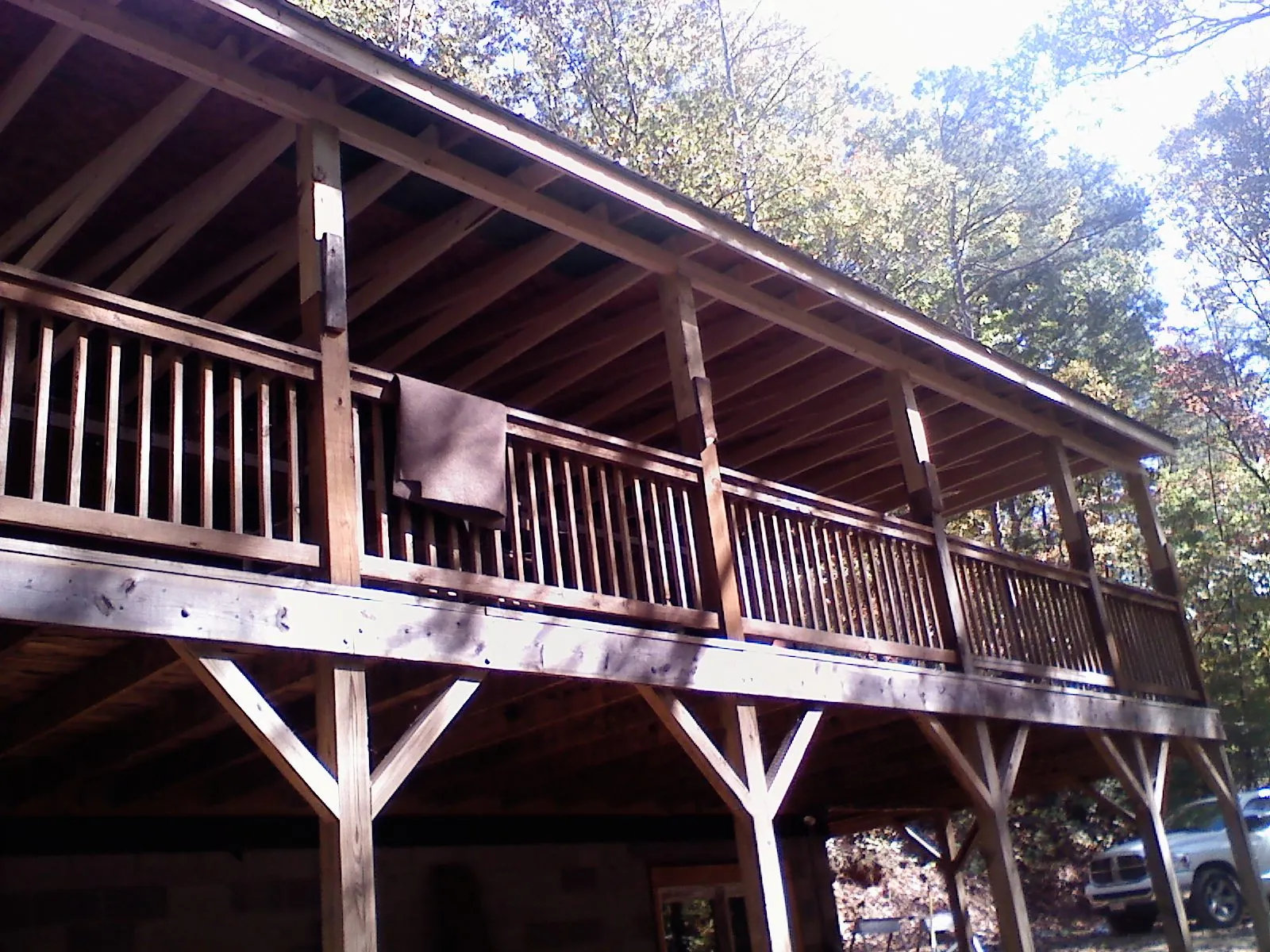 Timber framing under a new elevated porch and deck — Roof Leak Repair in Hall by Roofing Brothers
